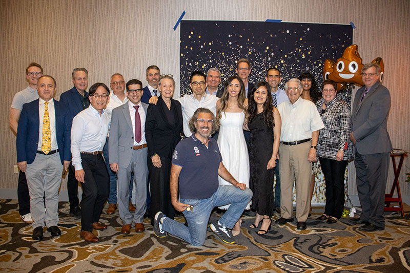 graduates and faculty group photo