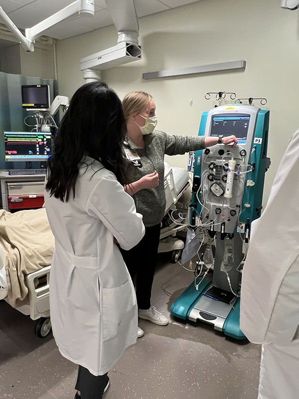 physicians participating in CRRT simulation