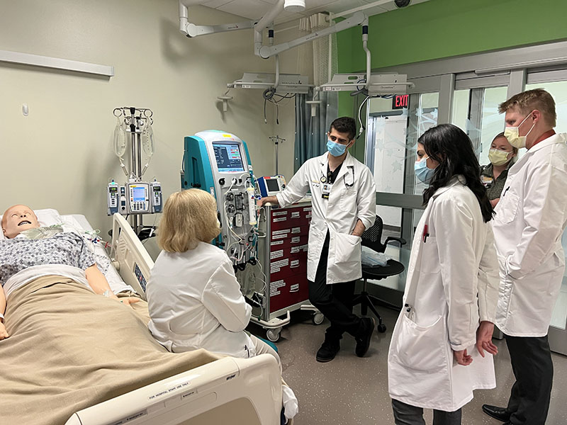 physicians participating in CRRT simulation