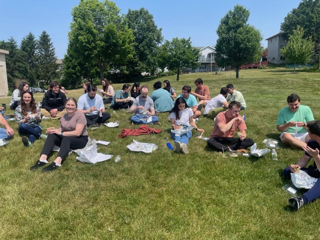Residents having a picnic outisde during the annual retreat