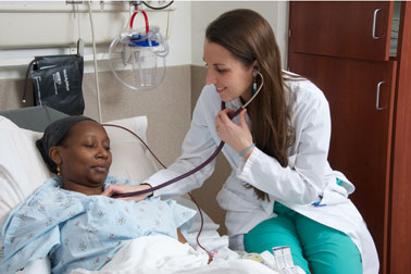 Resident with a patient