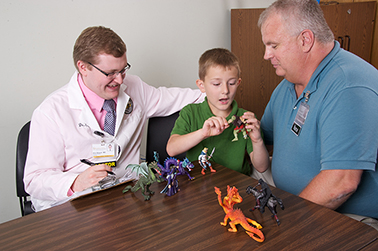 Resident with patient and parent
