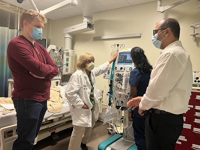 physicians participating in CRRT simulation