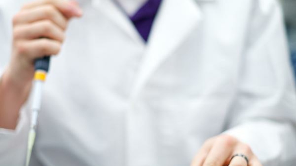 photo of a doctor working in a lab