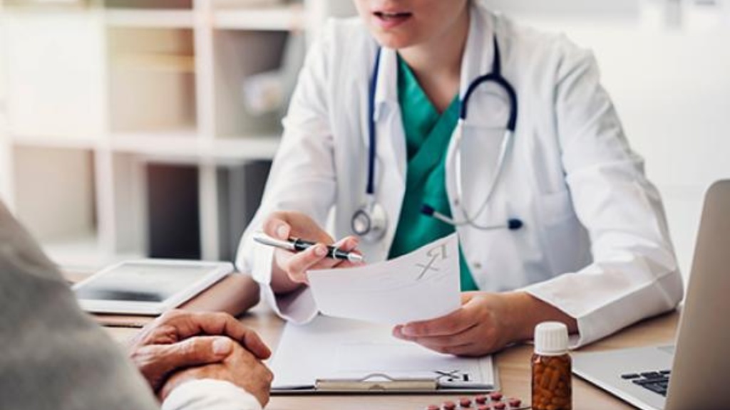 Physician talking with a patient